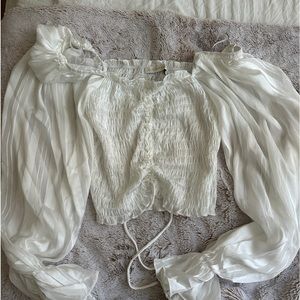 Long sleeve top with strings for adjustment!